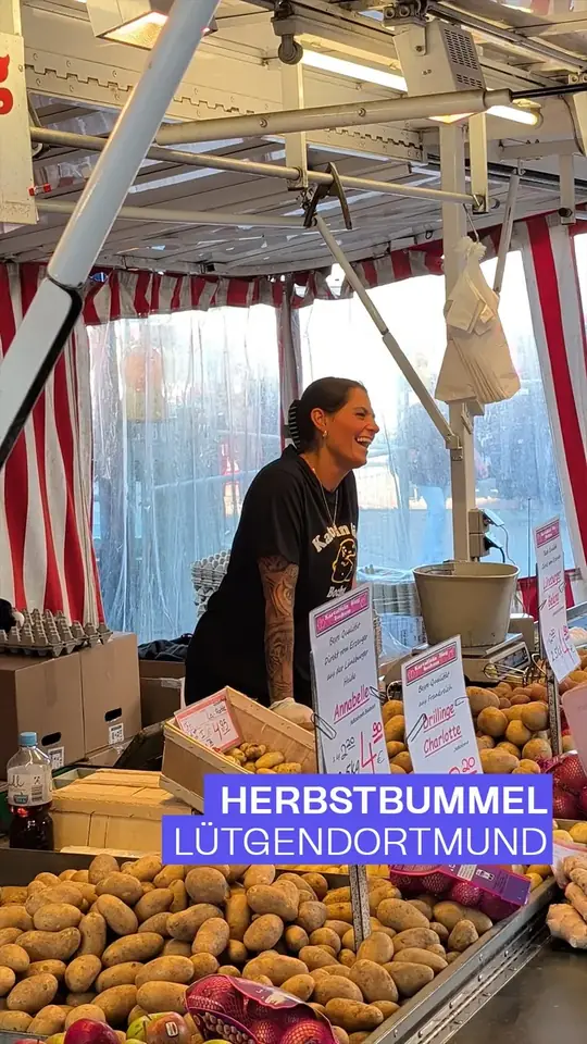 Cover: Marktstand mit Kartoffeln und einer lachenden Verkäuferin, dazu „Herbstbummel Lütgendortmund“.
